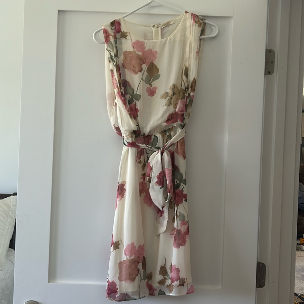 White and pink floral dress , larger open hole arms &tie around the waist